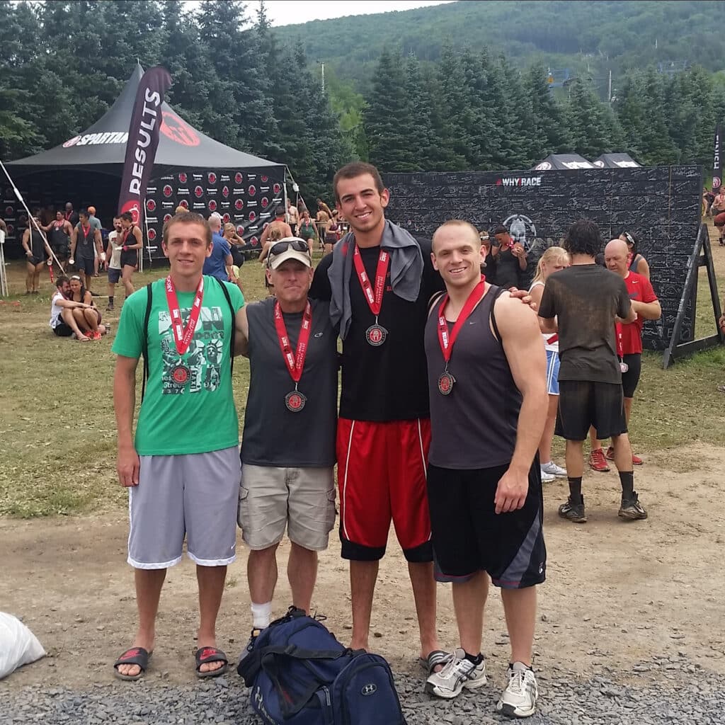 Tom Anderson after spartan race with friends