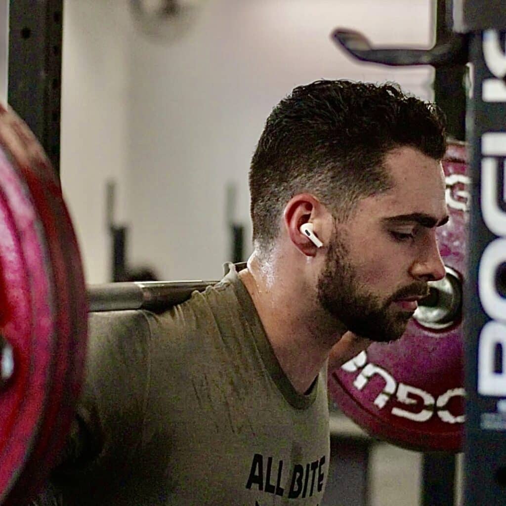 Aidan McFerran lifting weights