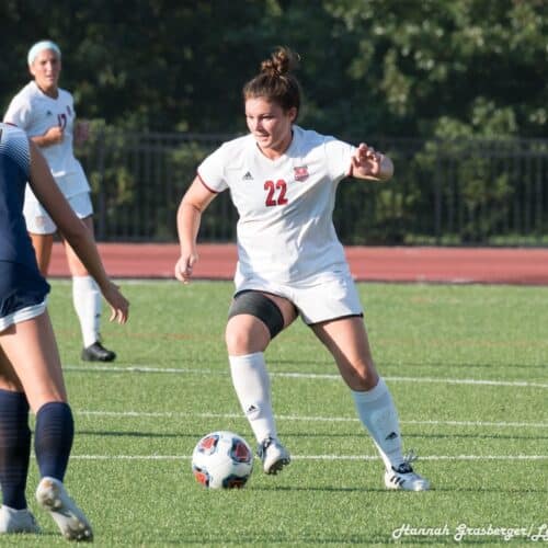 Alyssa Kospidas playing soccer