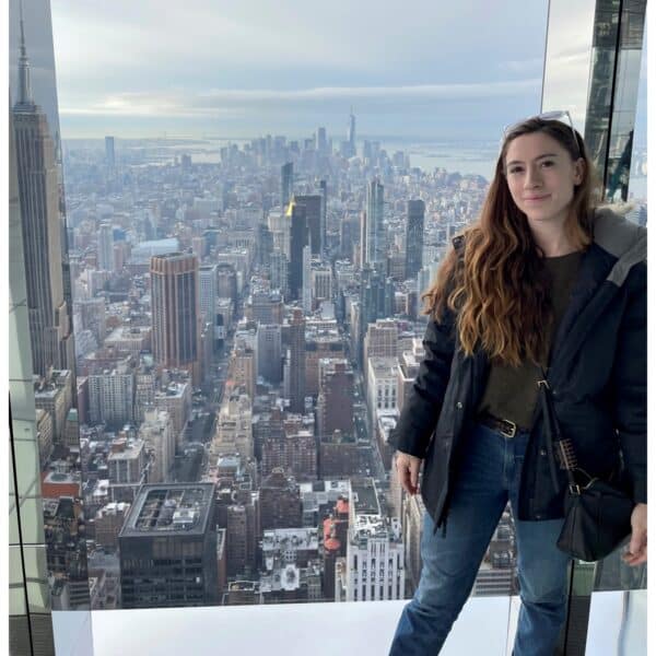 Amanda Fleres in front of a city view