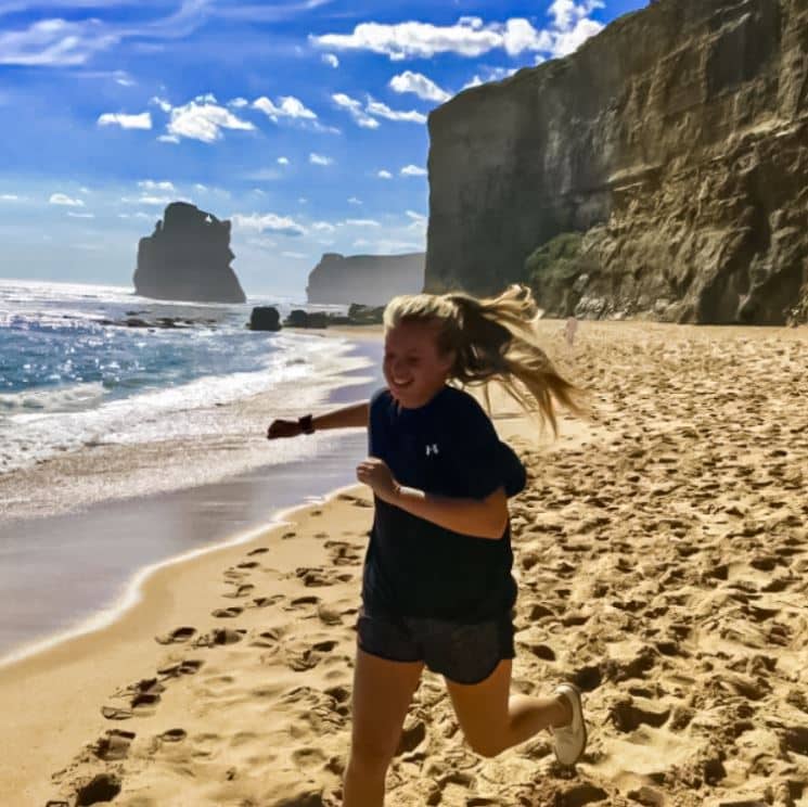 Meredith Nothel running on beach