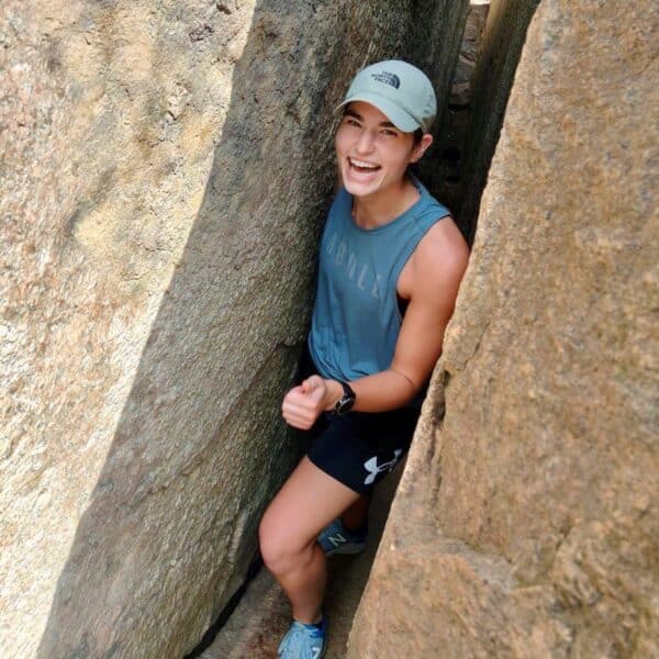 Brooke Doyle in between a rock