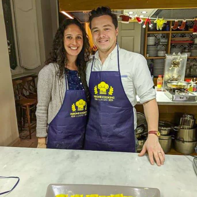 Genevieve Smith with friend cooking