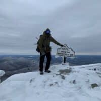 Dave Gardiner climbing a mountain