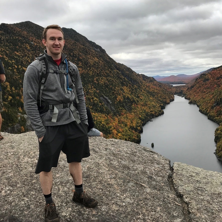 Dave Gardiner looking over a valley on a mountain