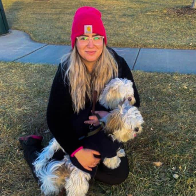 Melanie Gutierrez with two dogs