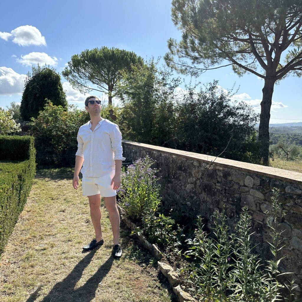 Dominick Platzer walking in a garden