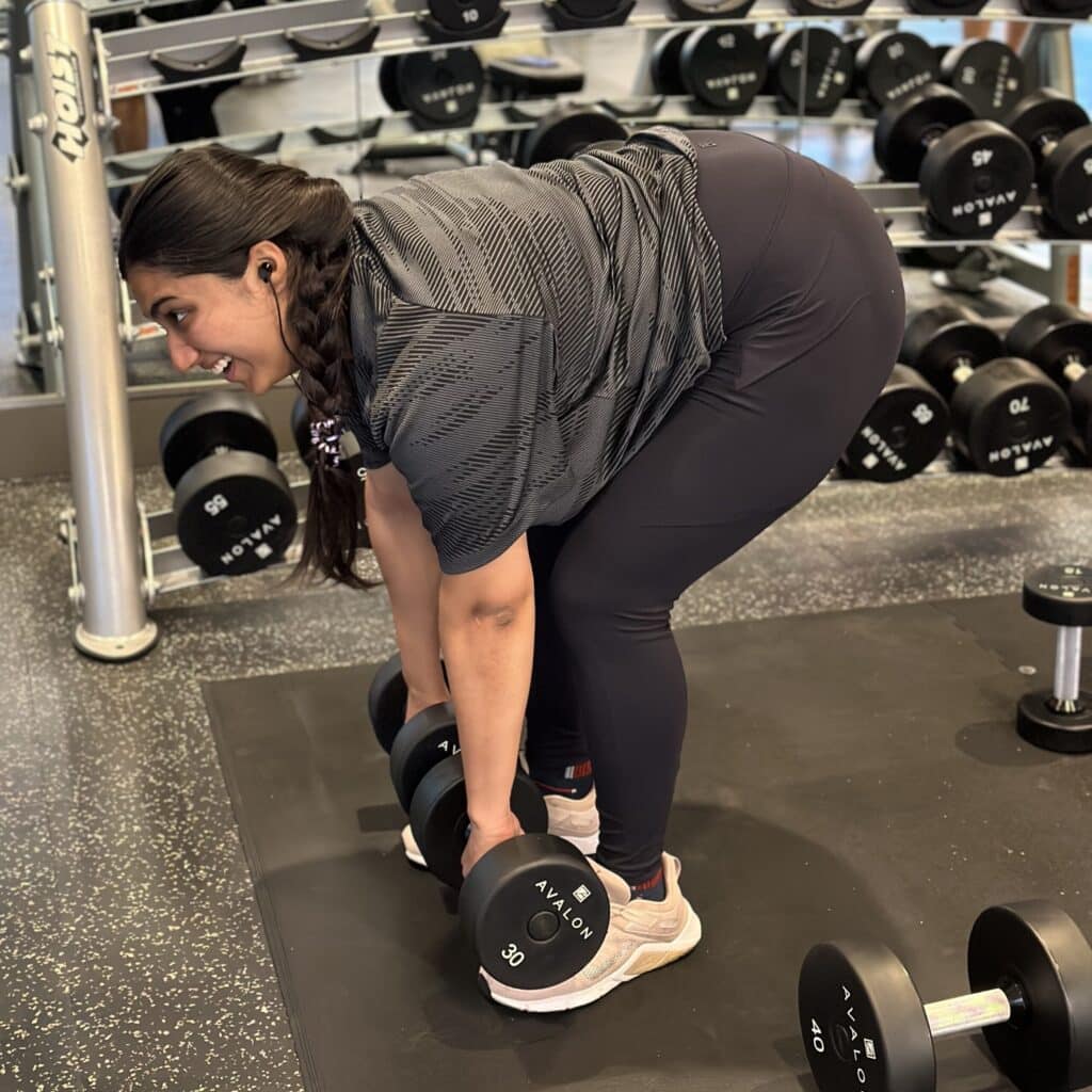 Eisha Joshi lifting weights