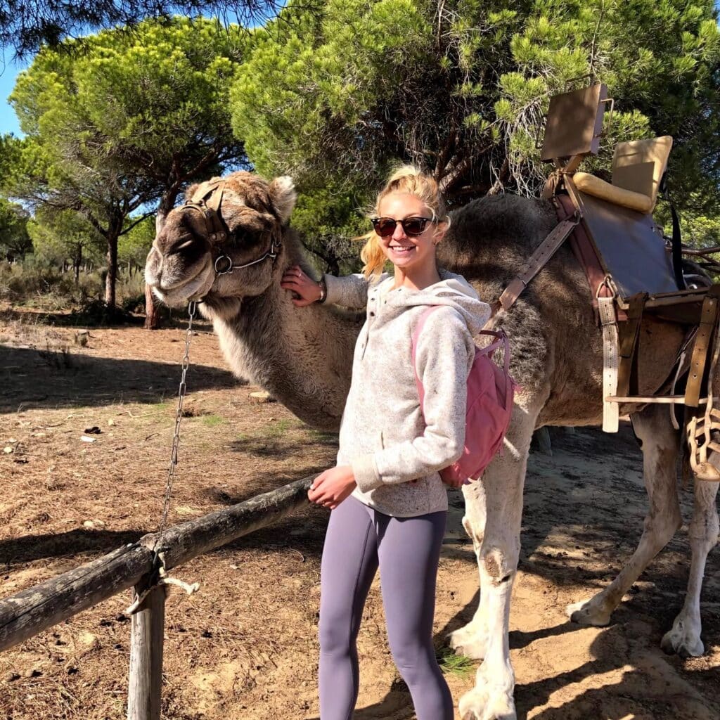 Emily Troy with a camel