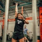 Emma Burnett lifting weights in the gym