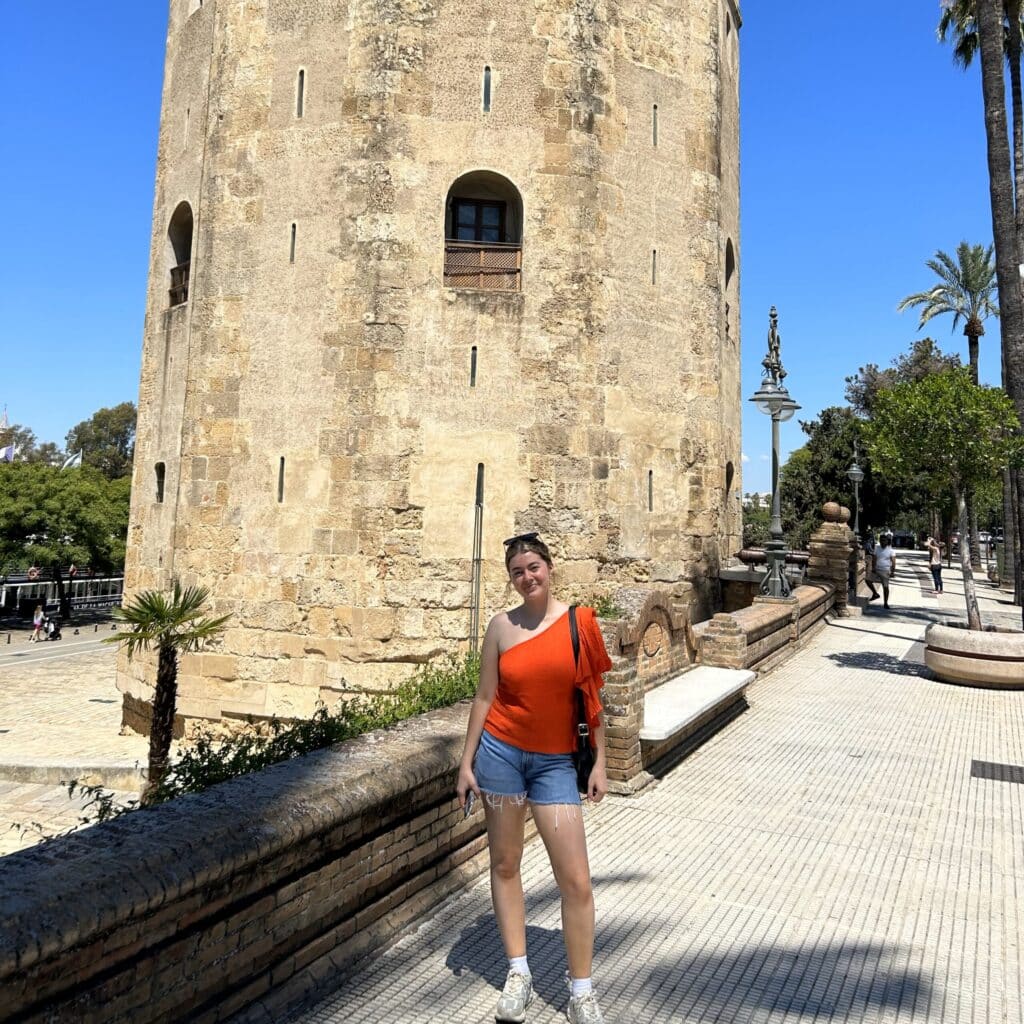 Evelyn Russo in front of a tower