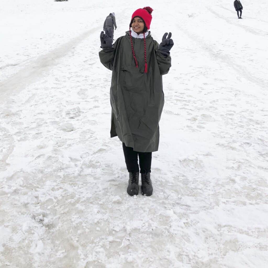 HEENA KALATHIYA standing in the snow