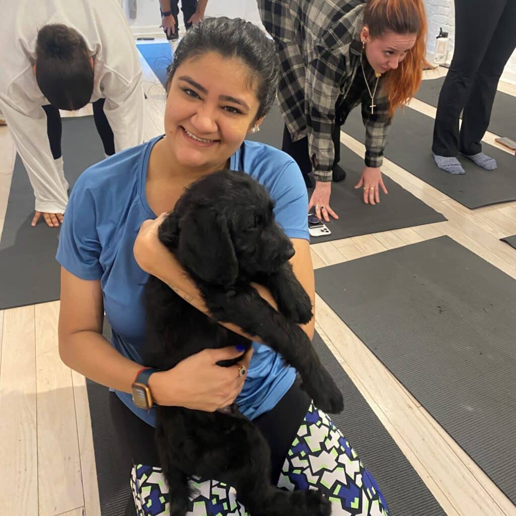 Himani Chokshi holding her puppy