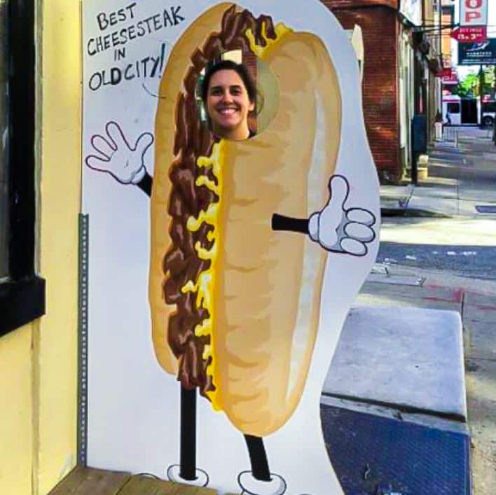 Alexis Lyons fun picture in beefsteak cropout sign