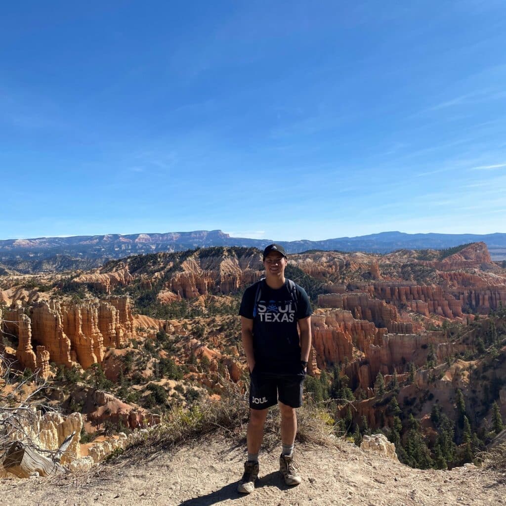 Justin Hoang hiking on a mountain