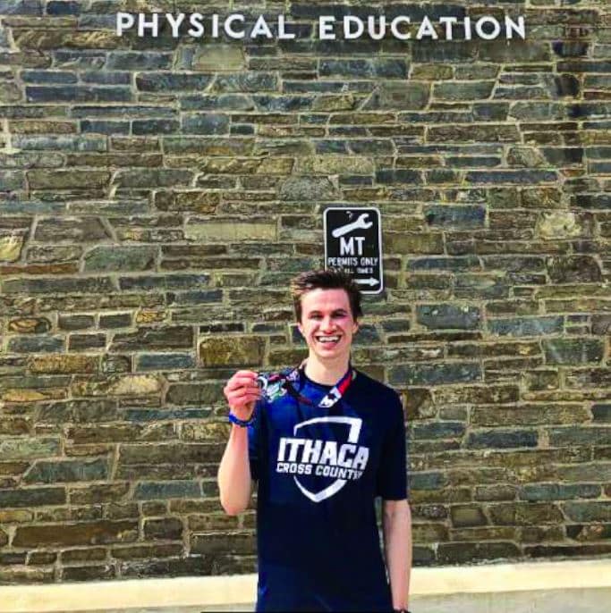 Kyle Davis with medal after Ithaca cross county run