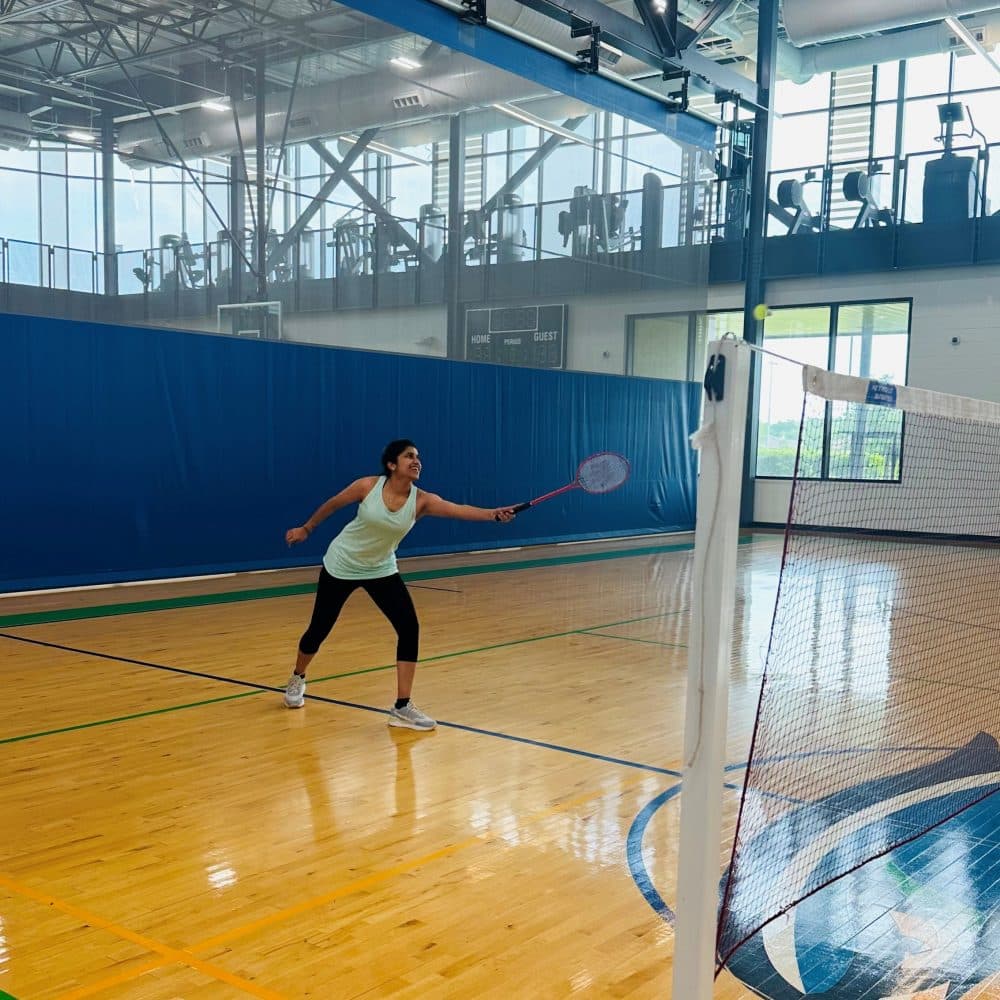 Pooja Shah playing badminton