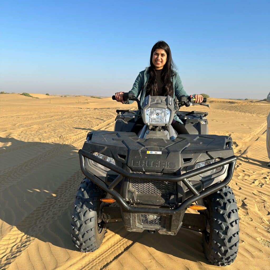 Pooja Shah riding an ATV