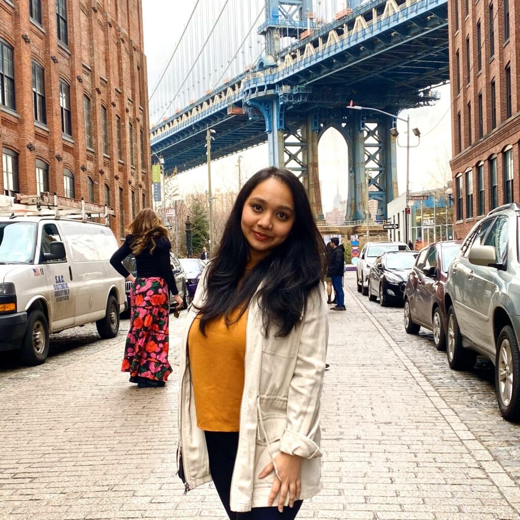 Resham Kadam in front manhattan bridge