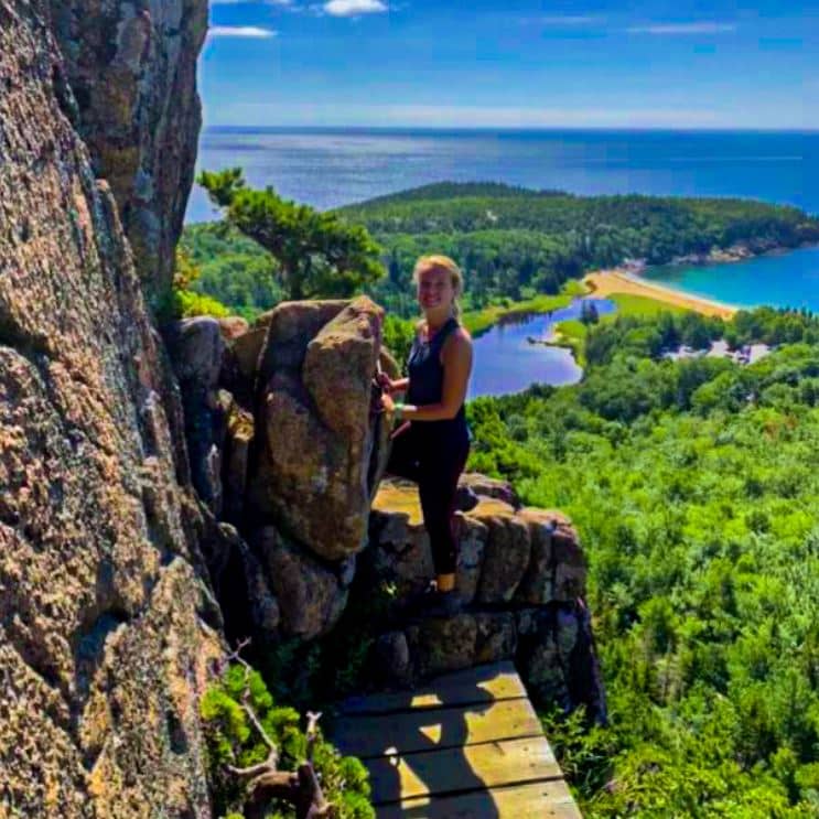 Meredith Nothel on a outlook overlooking the sea