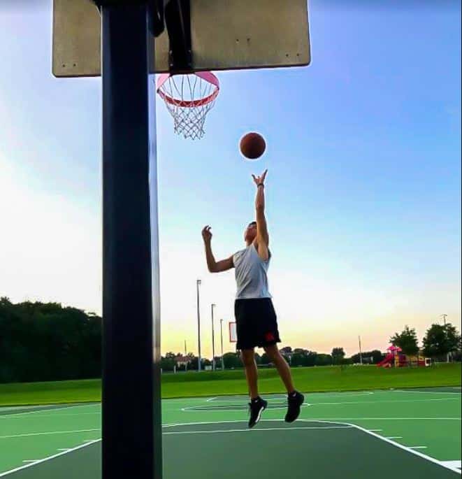 Justin Lugtu playing basketball