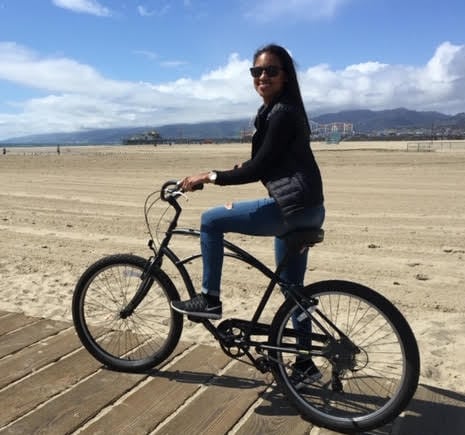 Odalisse Figueroa on bicycle