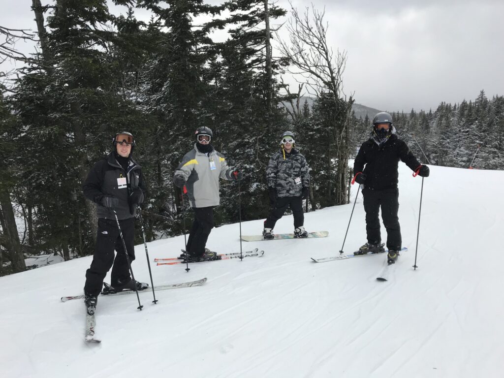 Timothy Caputo skiing with friends