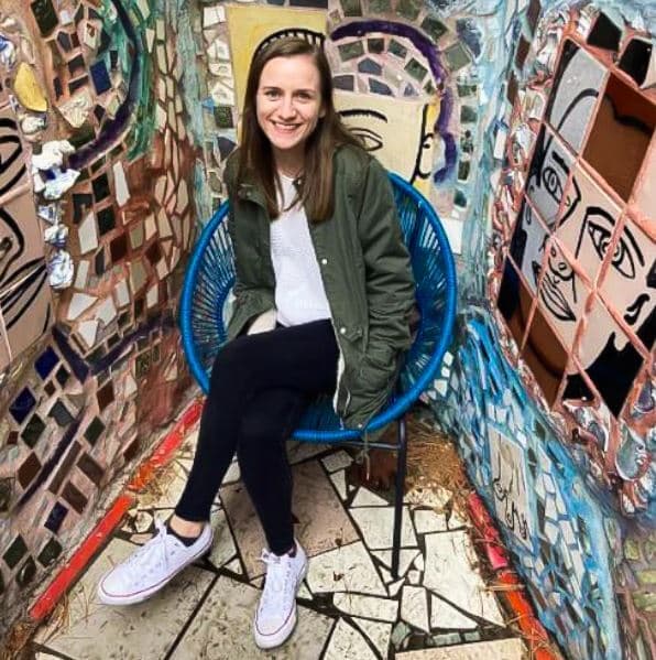 Laura Moran sitting in blue chair