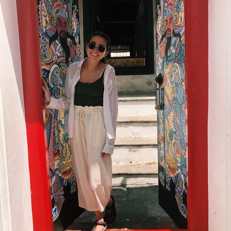 claire grossman standing in a doorway