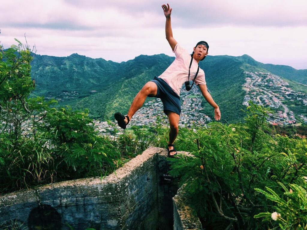 Colby Choi balancing on wall