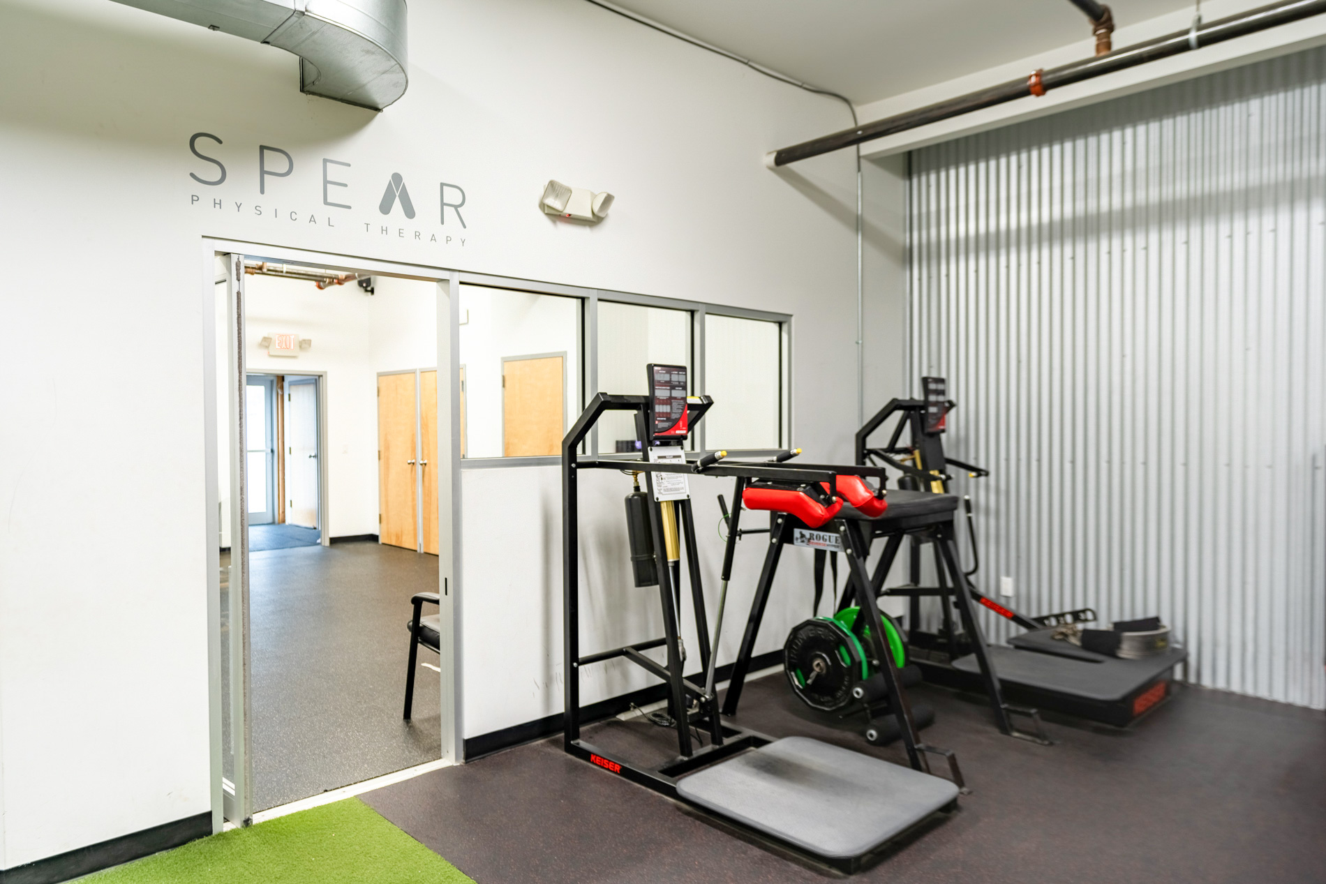 Training area at SPEAR physical therapy with strength machines