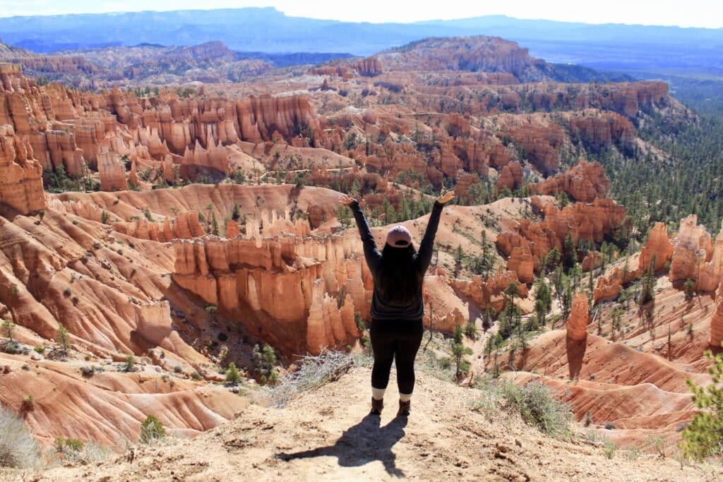 Marivi Lao standing on lookout in Zion national park