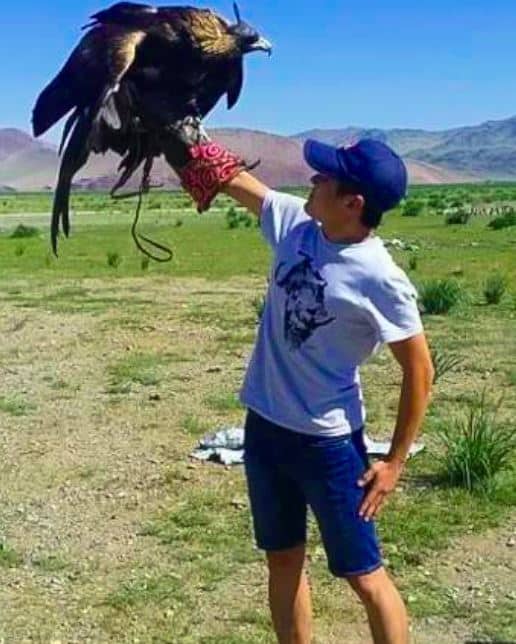 Jay Kwon with large eagle on his fist