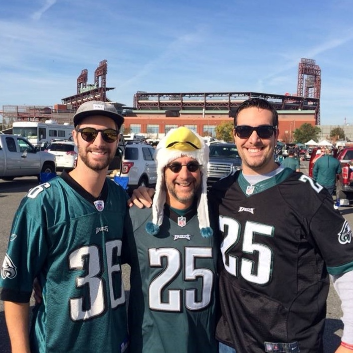 John Mackarey with friends before football game