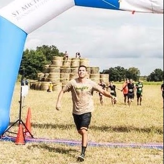 Joshua Rieders finishing a spartan race