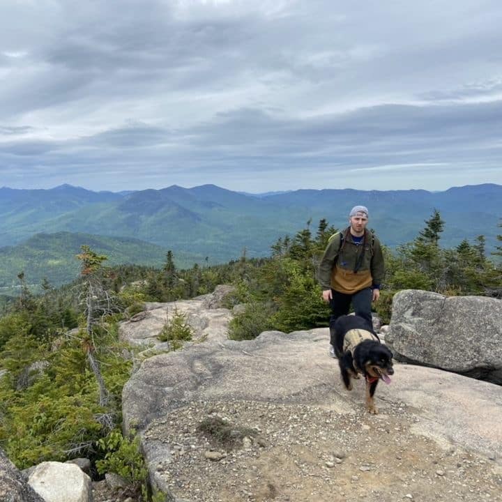 kyle koelsch hiking with his dog