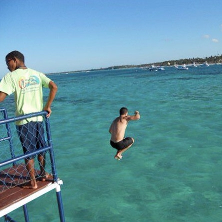 Michael Virgile jumping into water