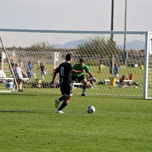 Michael Virgile playing soccer