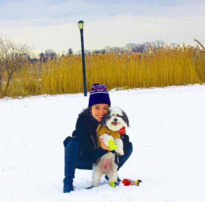 Michelle Sabogal with dog in winter