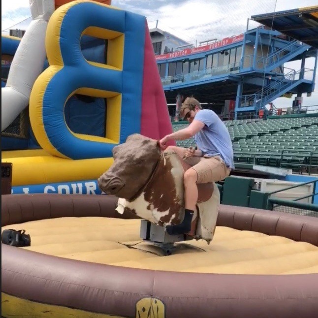 Ryan Coye riding a mechanical bull