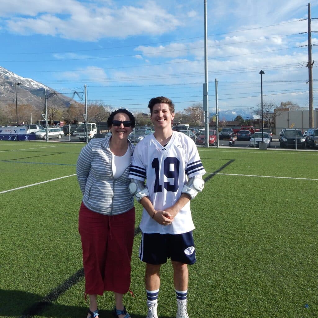 Ben Miles with woman on sports field