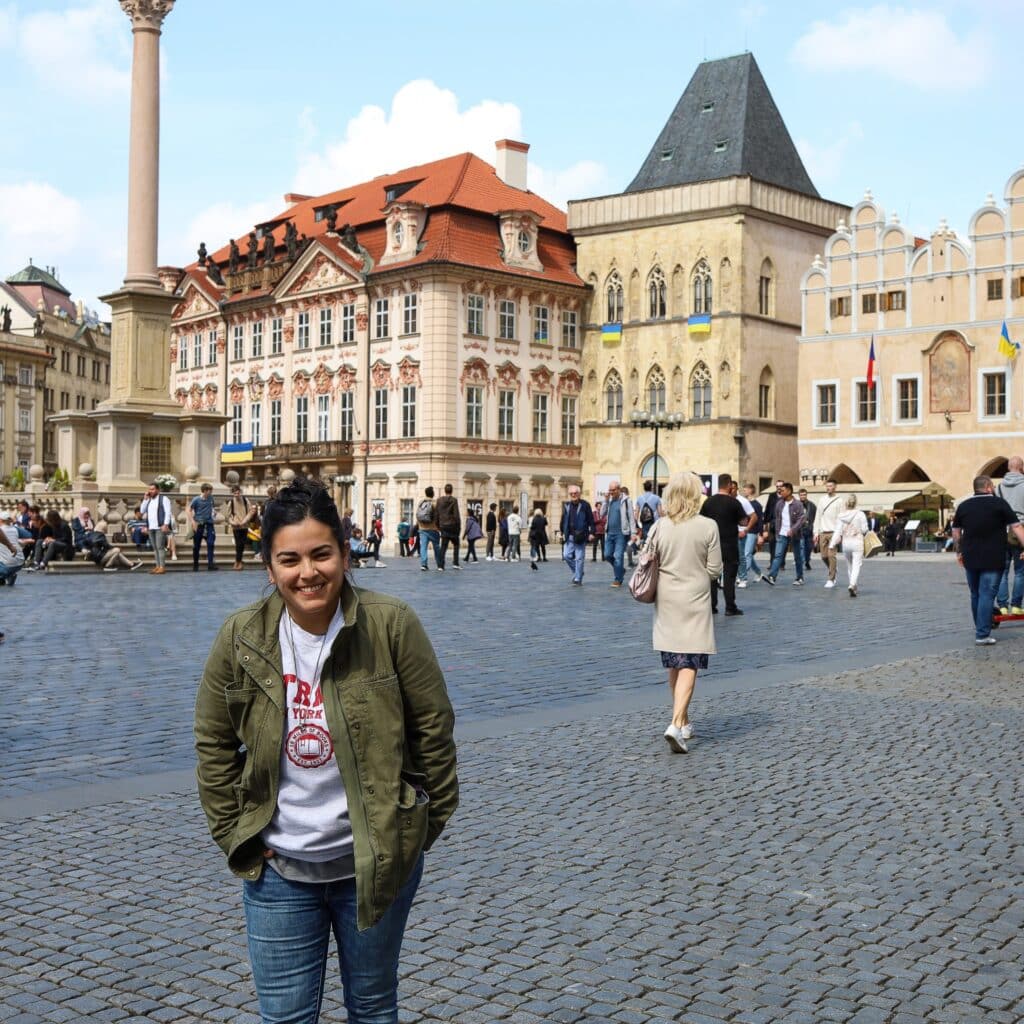 Beth Kines travel picture stabding on historic city square