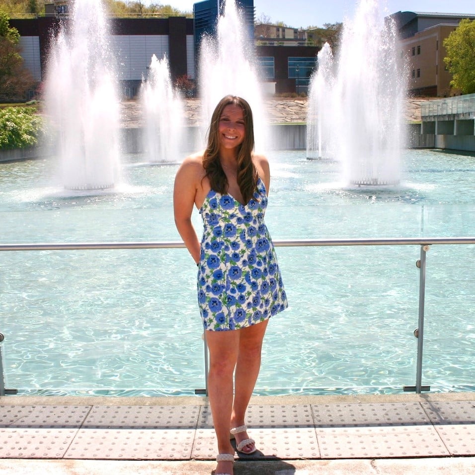 Camryn Gessner in front of fountain