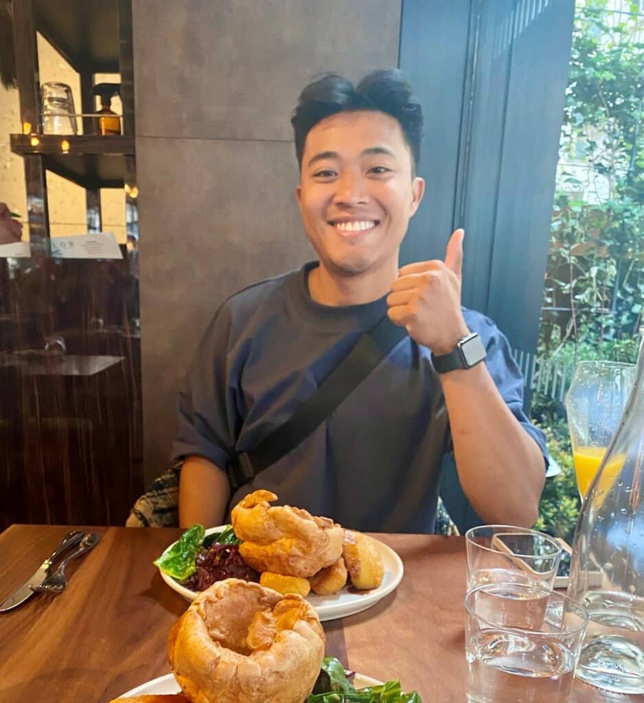 Christopher Vuong eating in restaurant