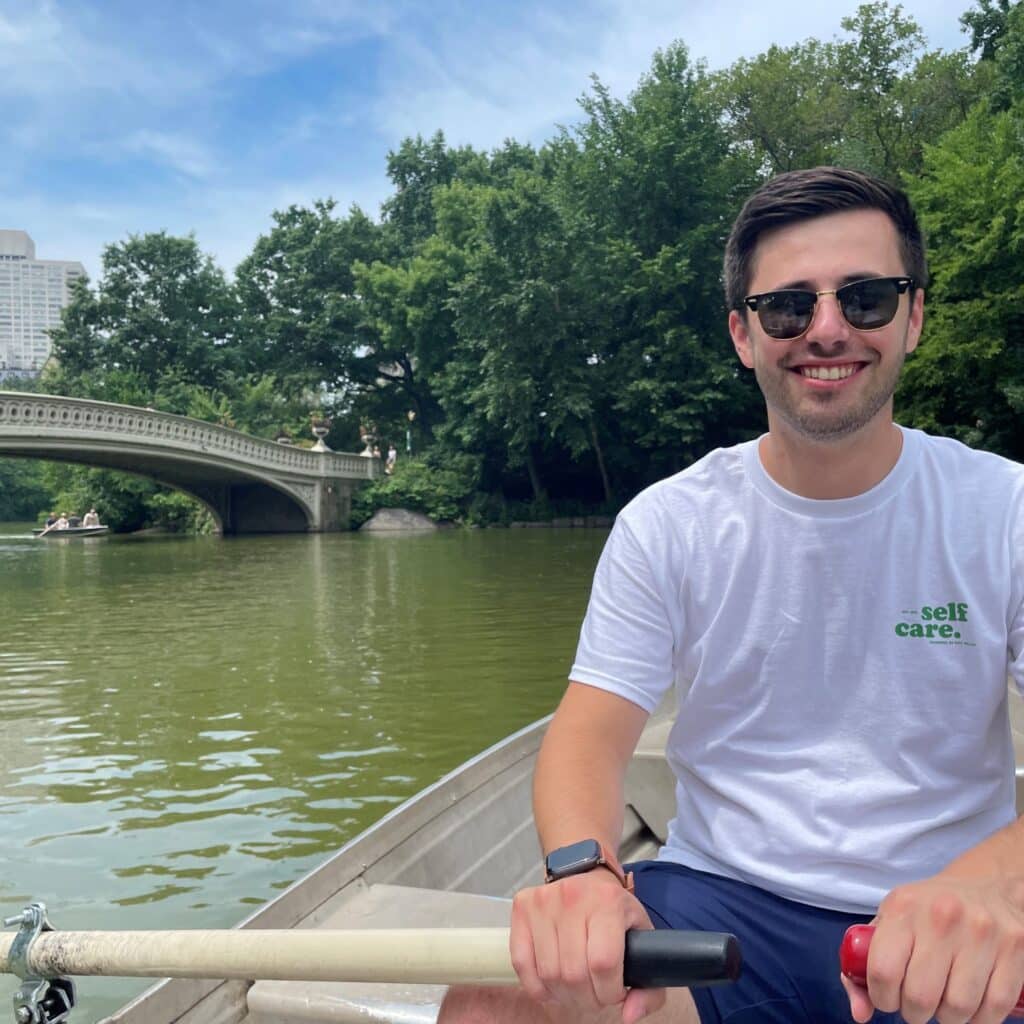 Christopher Doss rowing a canoe