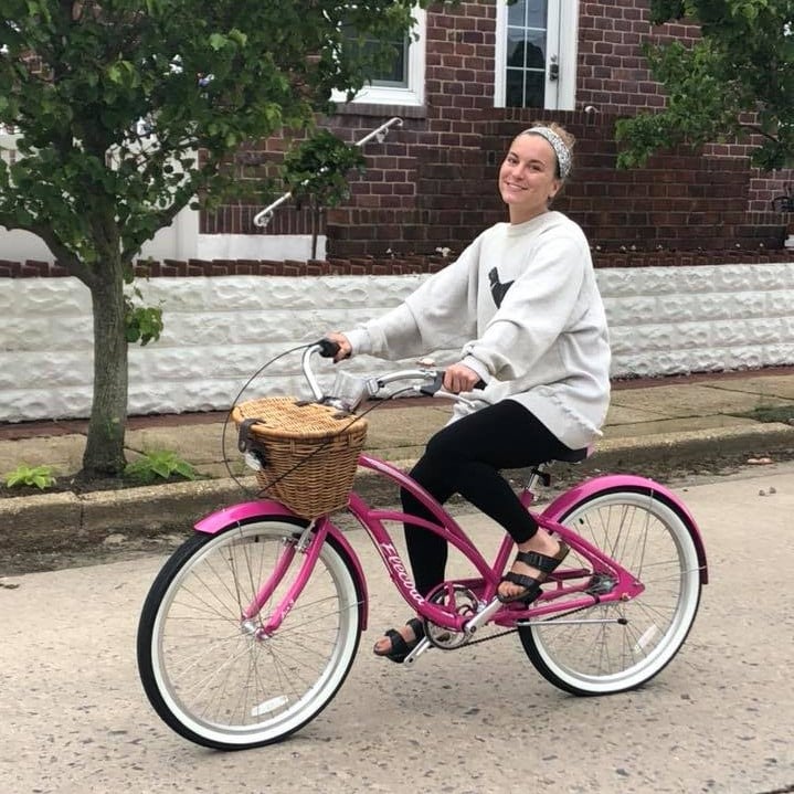 Claire Johannesen on pink cruiser bike