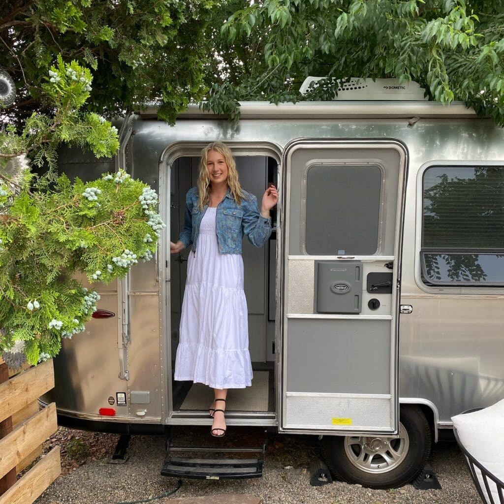 Claire Ruth standing in a trailer