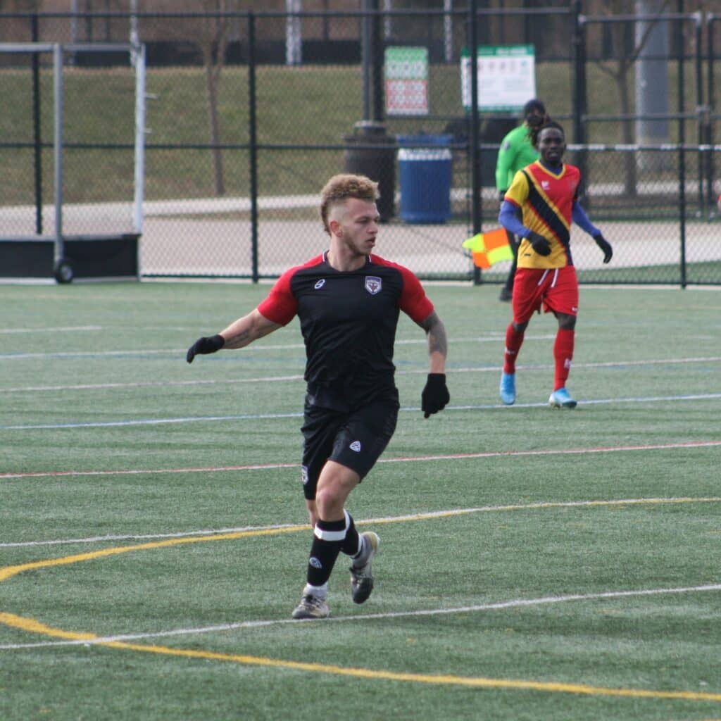 Clyde Staley playing soccer