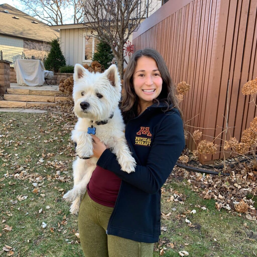 Elana Levine holding a puppy