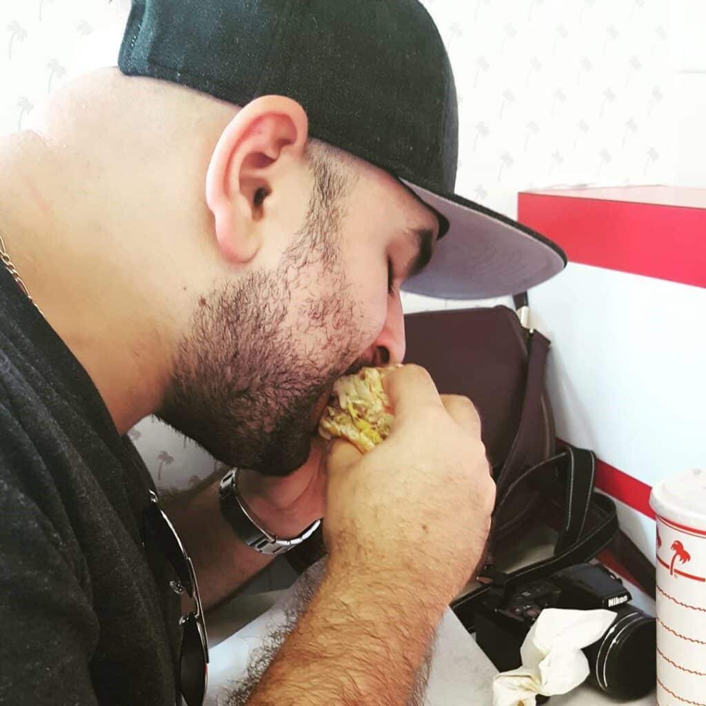 Elias Fraija eating a burger